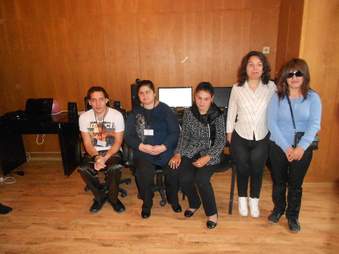 Participants in a group session gathered in the computer room of the Centre